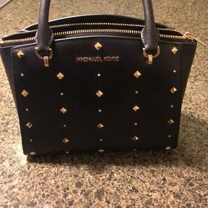 Michael Kors small black handbag.